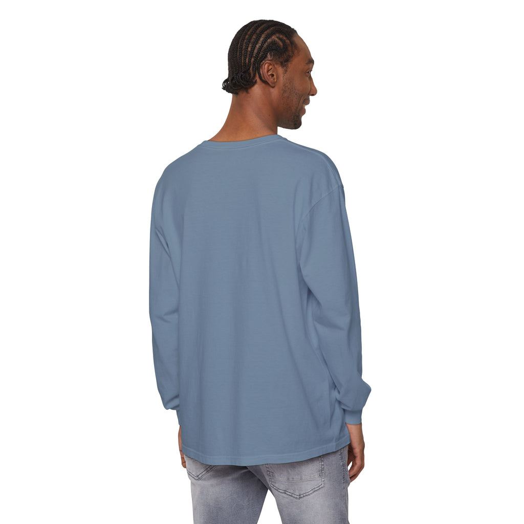 Man wearing a blue long-sleeve shirt on a white background