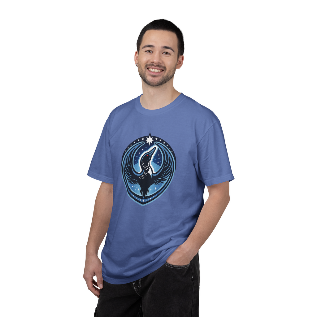 Man wearing a blue t-shirt with a graphic design on a white background