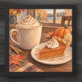 A framed autumn-themed art print showing a mug of whipped coffee with cinnamon, a slice of pumpkin pie on a plate, pumpkins, fall leaves, and a window view, displayed on a dark wood background.
