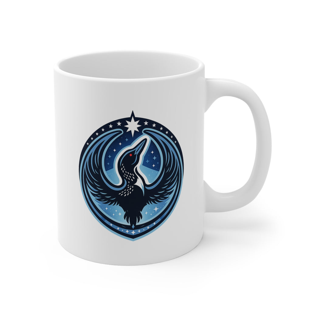 White mug with a blue and black Rebel Loon design on a white background