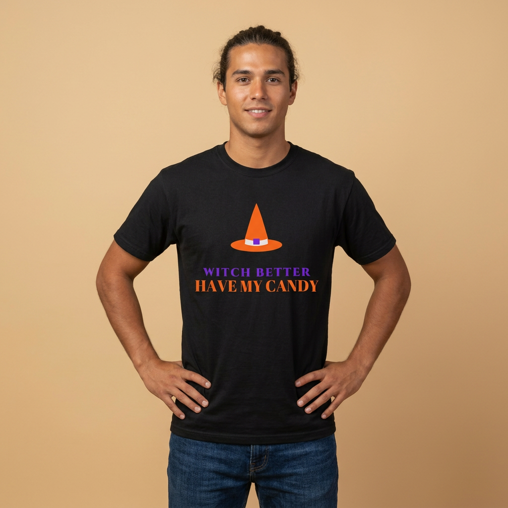 A man wearing a black t-shirt with a graphic of an orange witch hat and the text 'WITCH BETTER HAVE MY CANDY' in purple and orange, posed against a solid beige background.